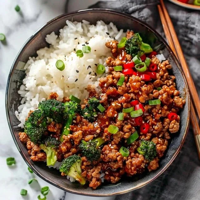 Firecracker Ground Chicken Bowls with colorful vegetables and rice